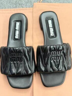 Miu Miu Black Matelassé Slides